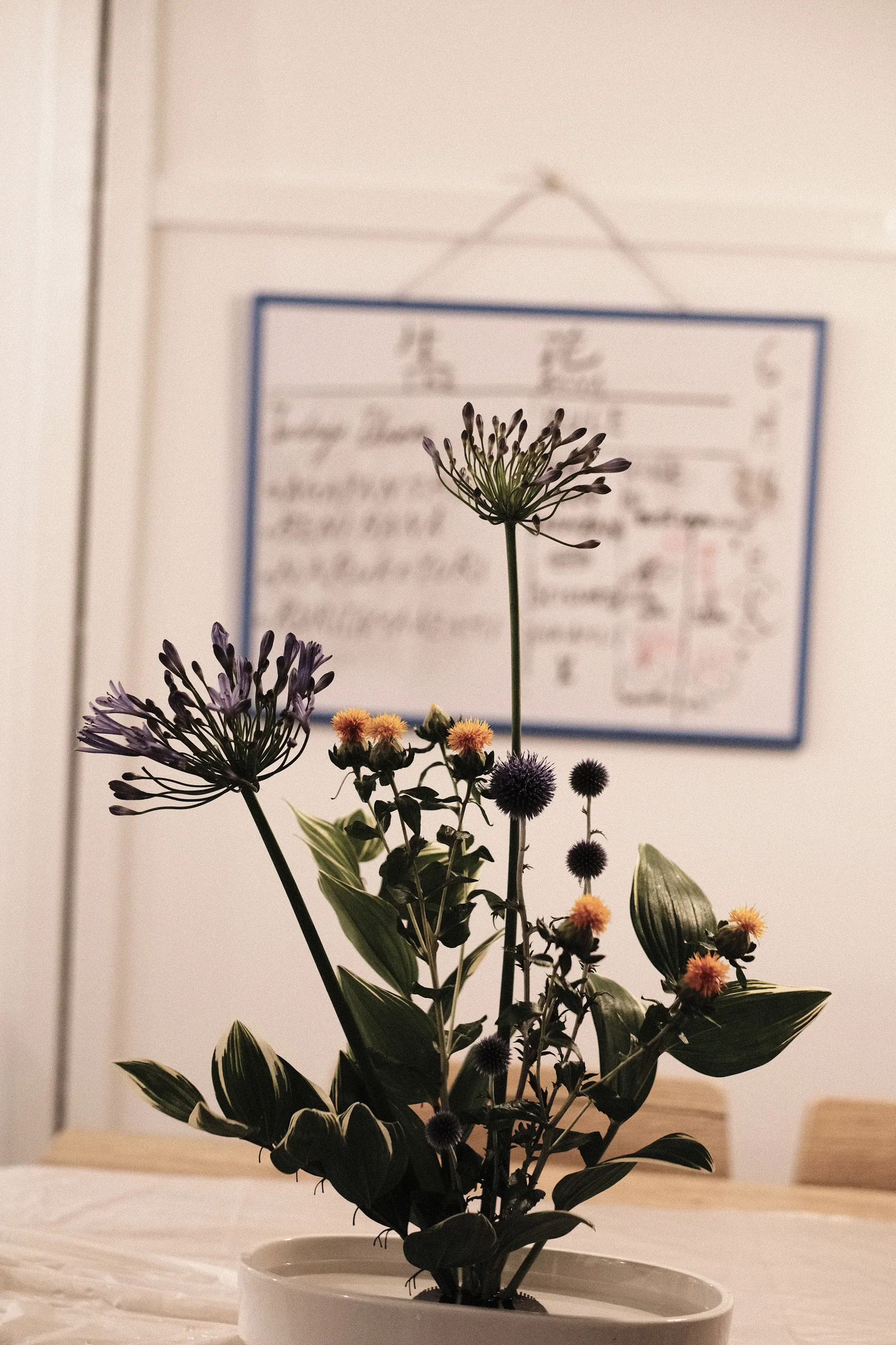 Ikebana arrangement against a quiet background